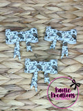 (DISCONTINUED) BEADABLE JUMBO SILICONE BOW WHITE BOWS AND FOOTBALLS (1ct)